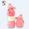 Foldable pink baby water pot, lightweight, BPA-free, ideal for kids' travel and school